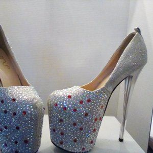 Ruby and crystal platform pumps with Lucite heels